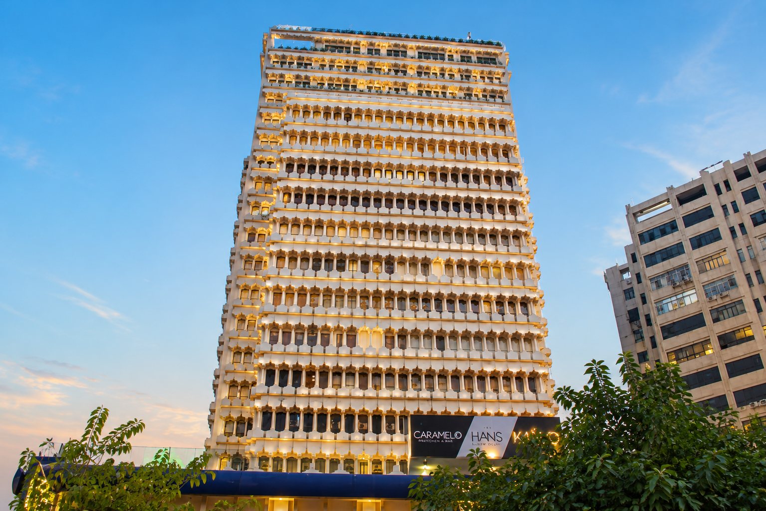 A heritage hotel façade at dusk